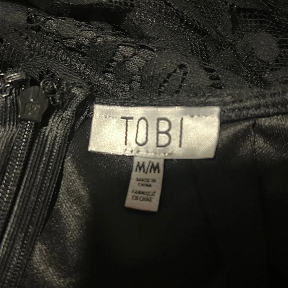 NWT size medium Tobi black lace high low skirt with